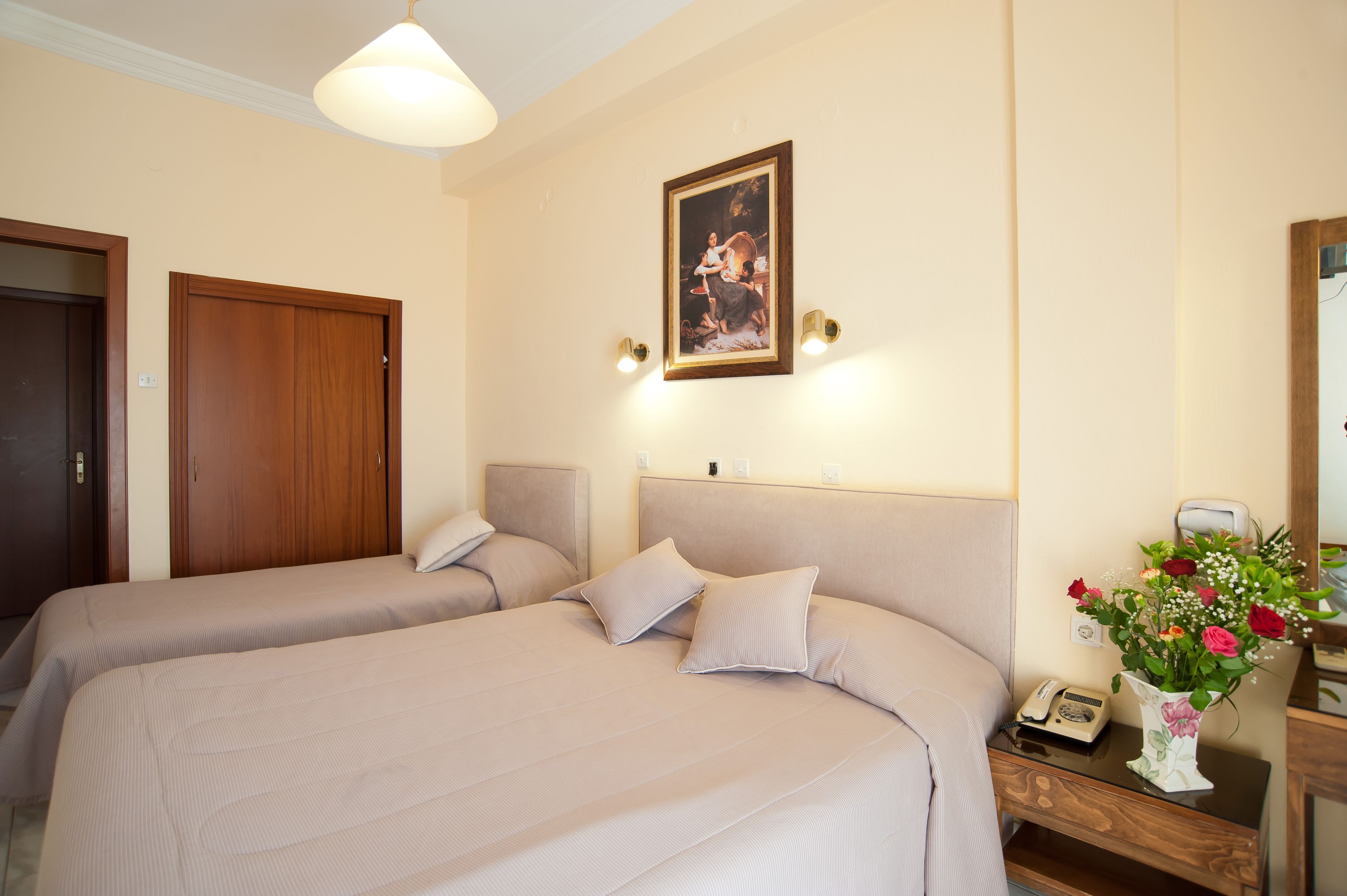 standard triple room | premium bedding, pillow-top beds, in-room safe, individually decorated