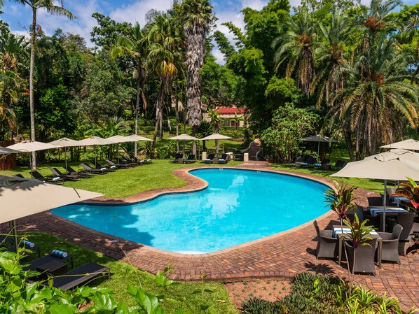 2 outdoor pools, pool umbrellas, pool loungers