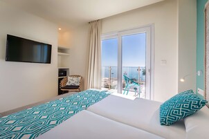 Double Room, Terrace, Sea View | Minibar, in-room safe, individually decorated, individually furnished