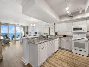 Condo, Multiple Beds, Balcony, Ocean View (#1131 - No Pets) | Private kitchen | Fridge, microwave, oven, stovetop - Emerald Beach Resort by Resort Collection (Panama City Beach)
