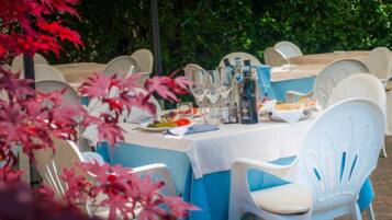 Breakfast, lunch served; Italian cuisine, al fresco dining
