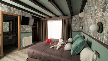 Suite junior | Camas con efecto memoria, escritorio, cunas y camas extra