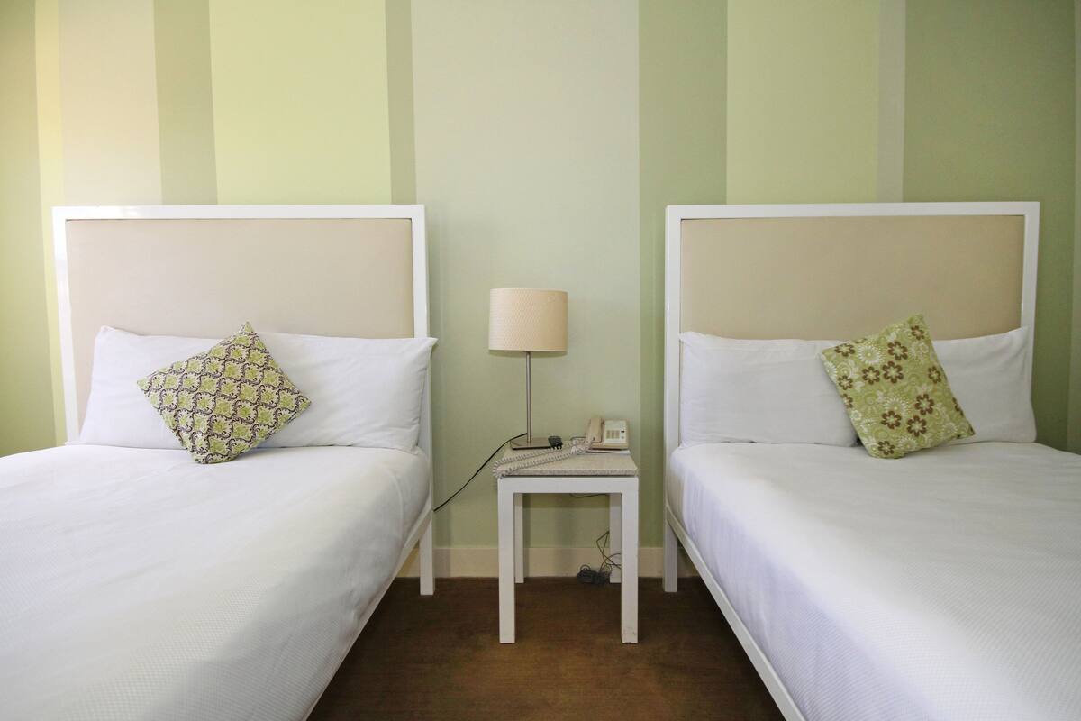 Double Room, City View | In-room safe, blackout drapes, iron/ironing board, cribs/infant beds