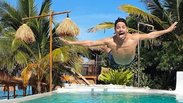 Outdoor pool, open 8 AM to 8:00 PM, pool umbrellas, sun loungers