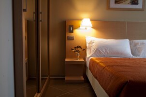 Sábanas italianas Frette, minibar y caja de seguridad en la habitación 