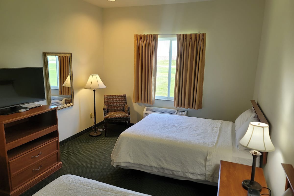 standard double room, 2 queen beds | 1 bedroom, desk, iron/ironing board, free cots/infant beds