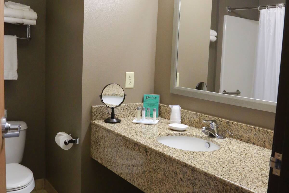 combined shower/bathtub, free toiletries, hair dryer, towels