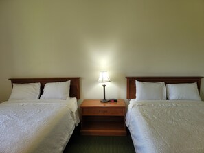 Standard room with two double beds | Desk, laptop workspace, iron/ironing board, free WiFi