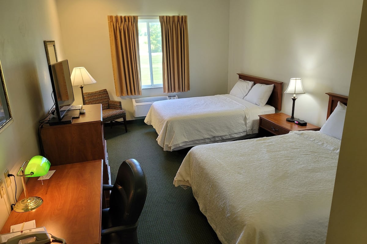 standard double room, 2 queen beds | 1 bedroom, desk, iron/ironing board, free cots/infant beds