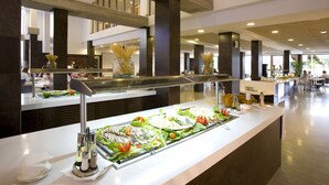 A buffet area with various food items and condiments. - R2 Bahía Playa Design Hotel & Spa Wellness - Adults Only (Tuineje)