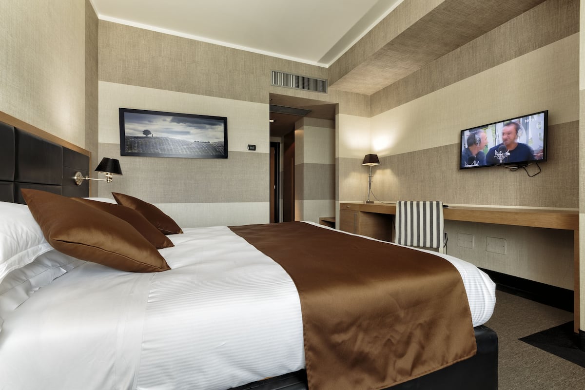 Down duvets, minibar, in-room safe, desk