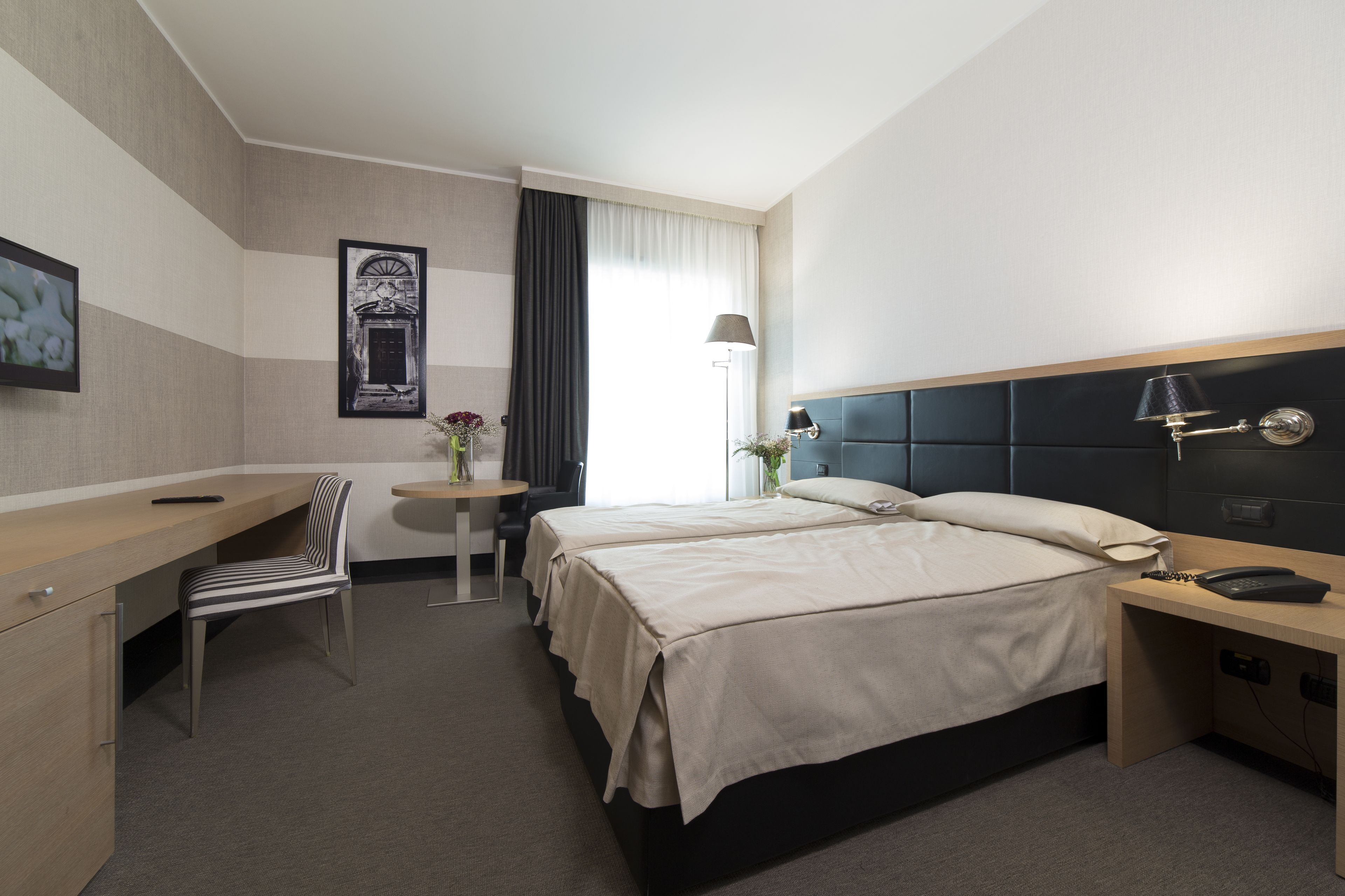 standard double room | down duvets, minibar, in-room safe, desk