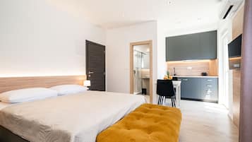 Studio with Balcony | 1 bedroom, in-room safe, desk, blackout drapes
