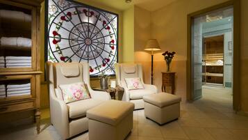 Relax in comfort with plush armchairs and a cozy reading nook.
