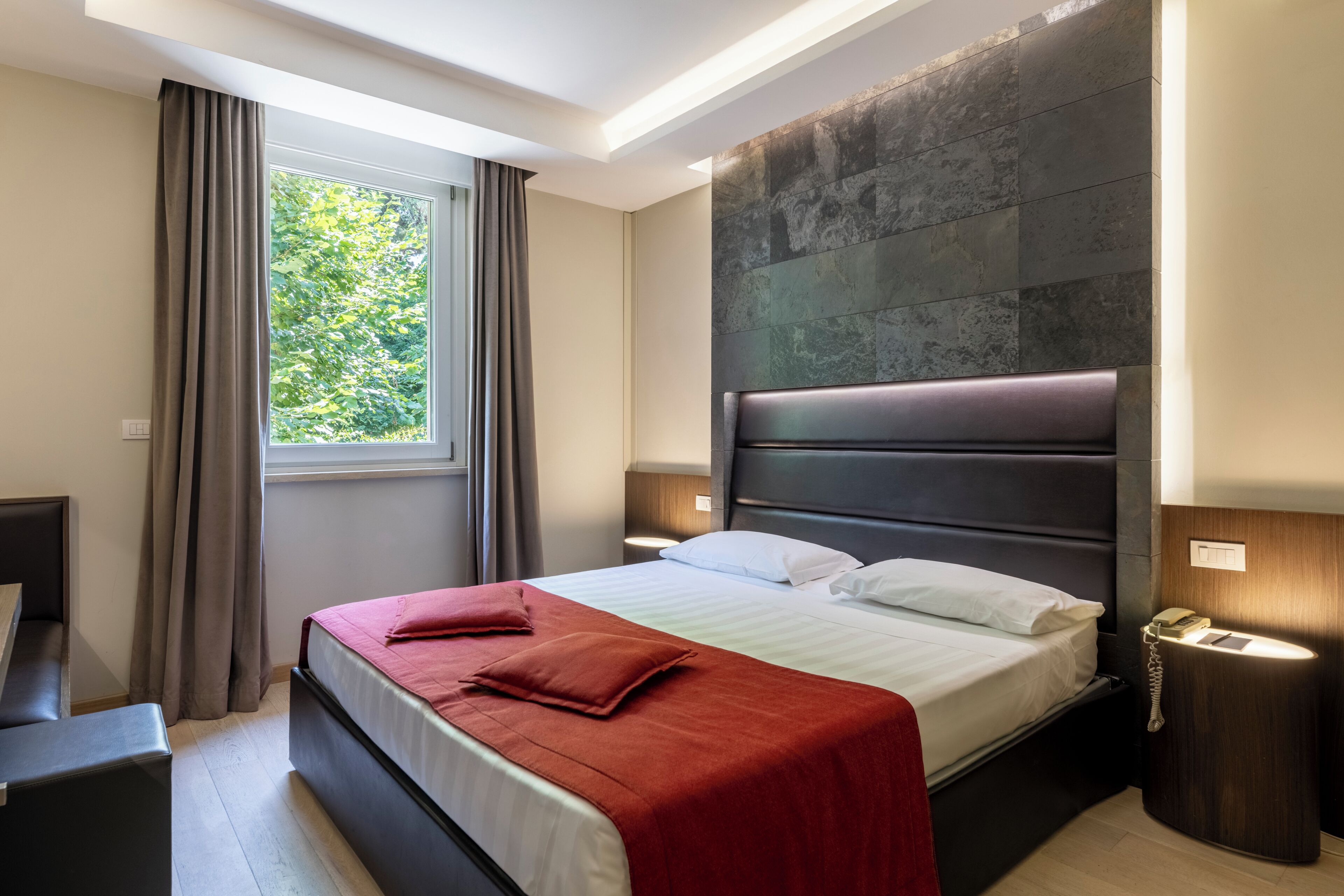 Hypo-allergenic bedding, free minibar, in-room safe, desk