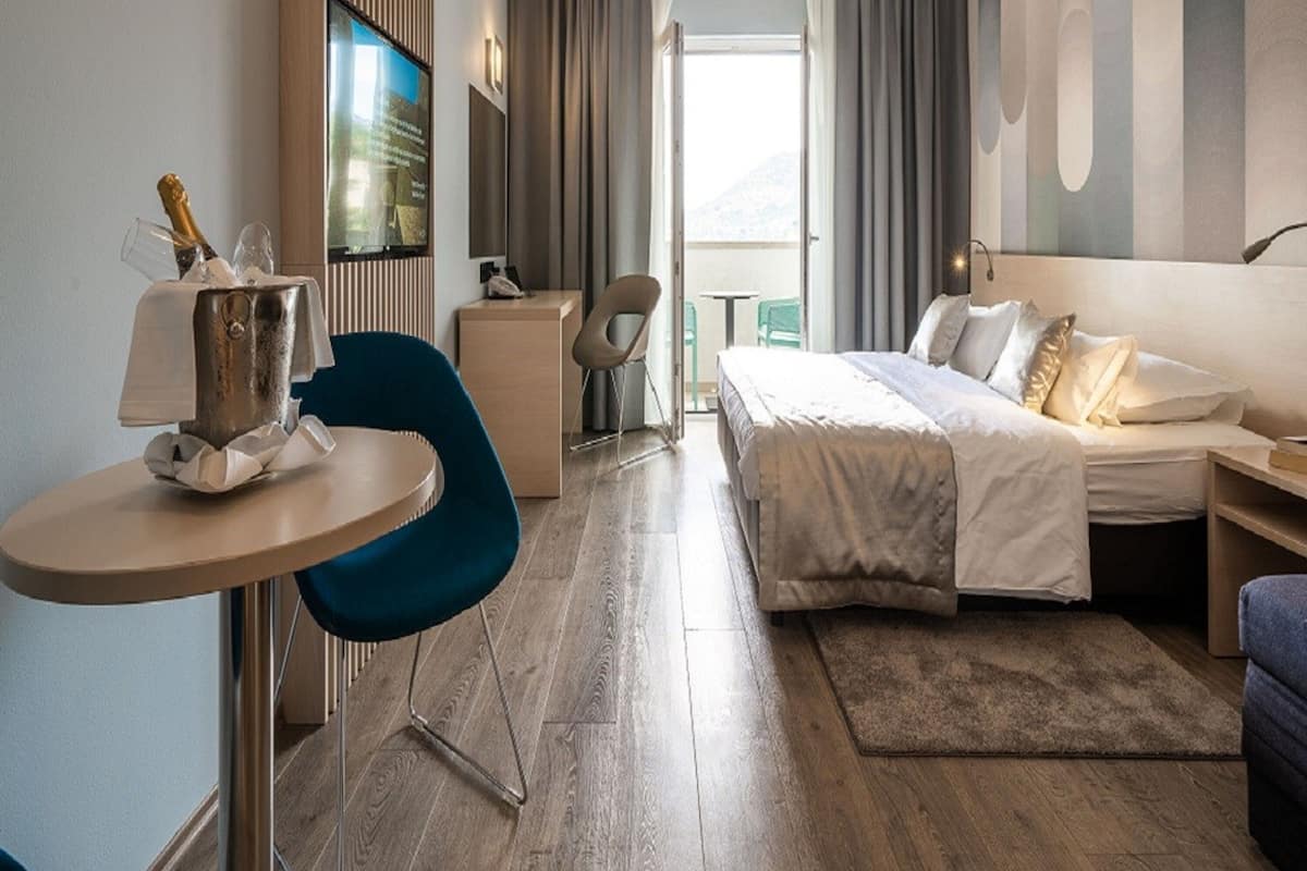 superior double room, balcony, sea view | hypo-allergenic bedding, in-room safe, desk, laptop workspace