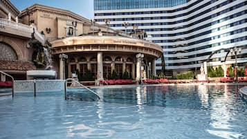 2 outdoor pools, open 7:00 AM to 9:00 PM, pool cabanas (surcharge)