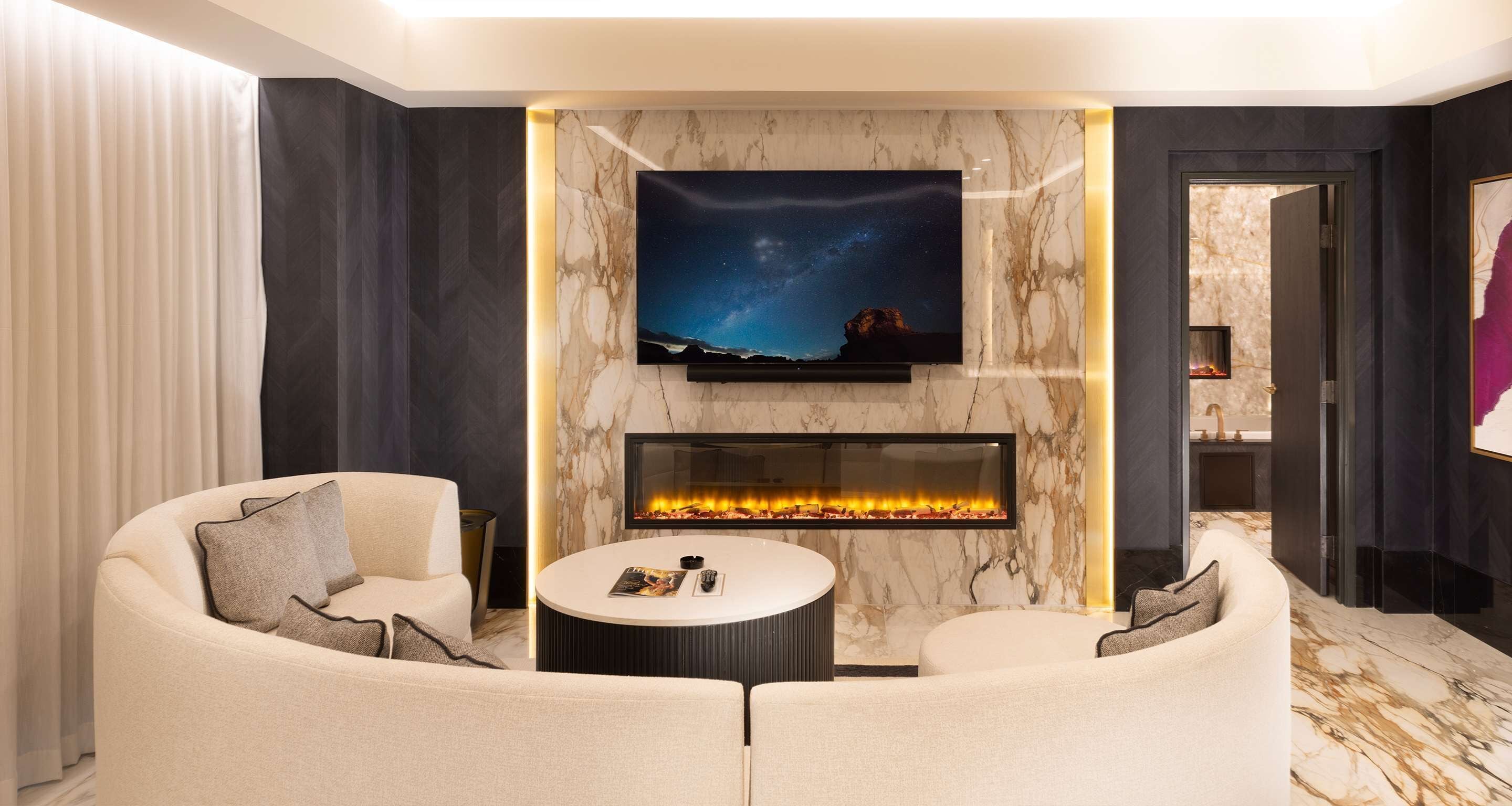 penthouse suite, 1 king bed, smoking, jetted tub (separate living room) | premium bedding, in-room safe, desk, laptop workspace