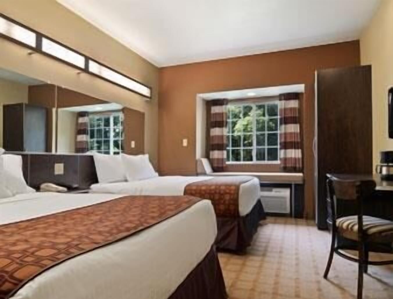 Premium bedding, down comforters, in-room safe, desk