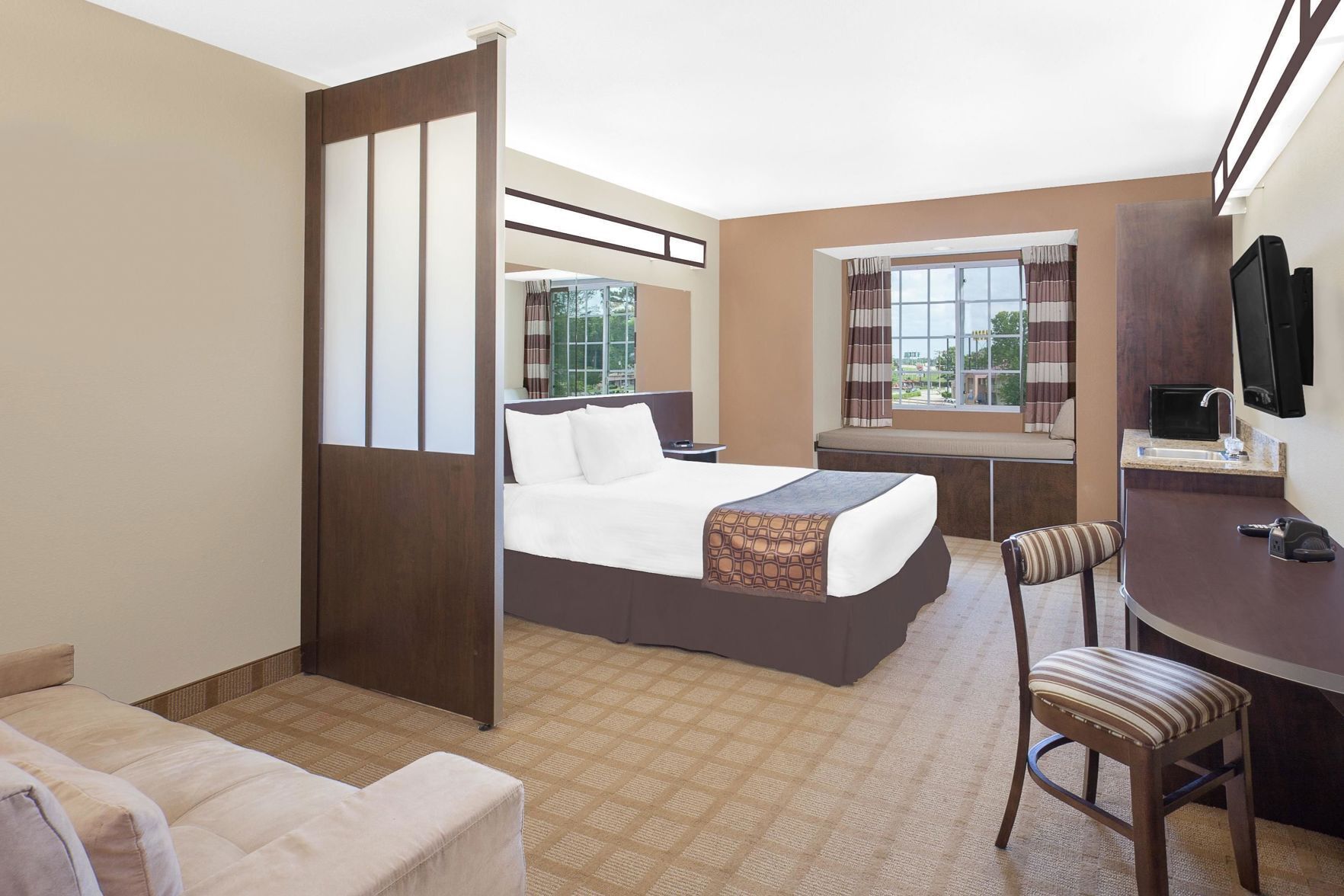 Premium bedding, down comforters, in-room safe, desk