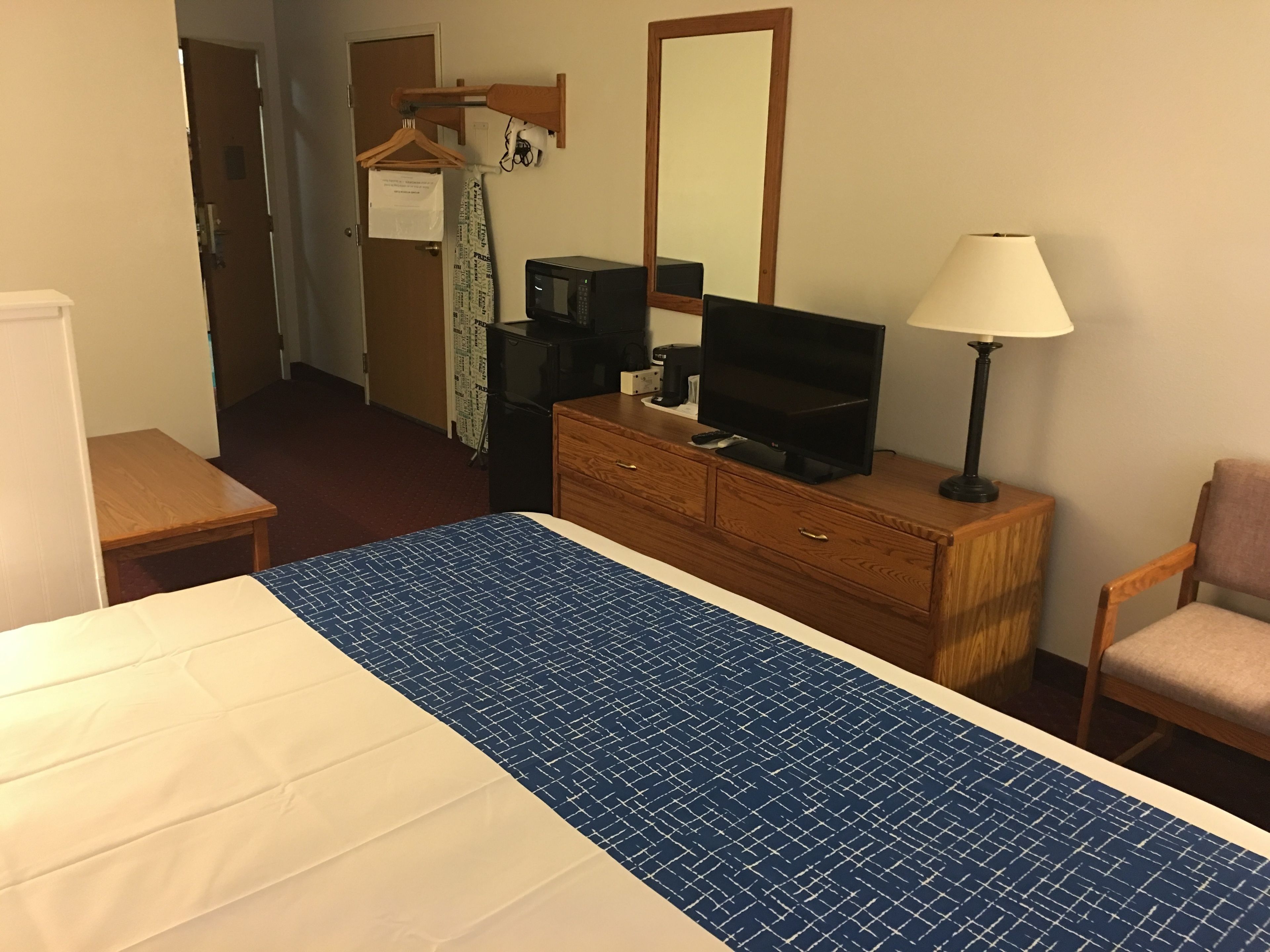 pillow-top beds, desk, blackout curtains, iron/ironing board