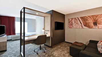 Premium bedding, pillow-top beds, desk, laptop workspace