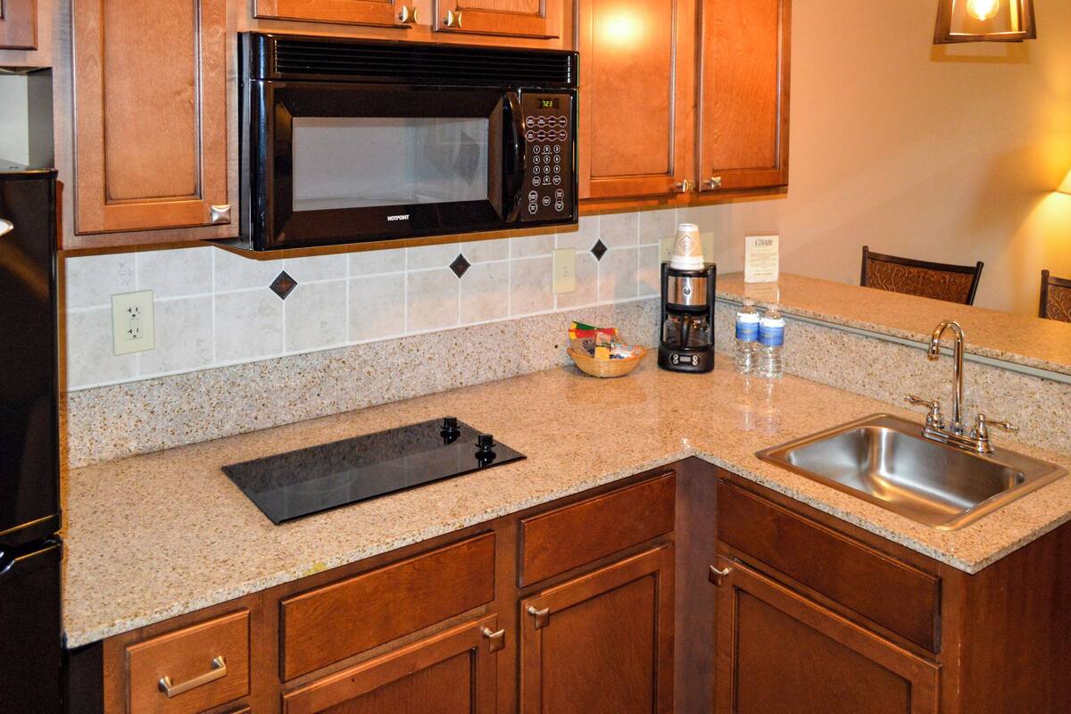 classic studio suite, 2 double beds, kitchen | desk, blackout curtains, soundproofing, iron/ironing board