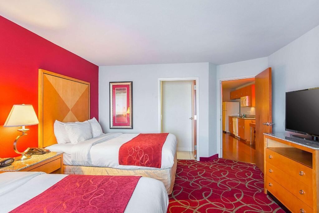 Down duvets, pillow-top beds, desk, laptop workspace