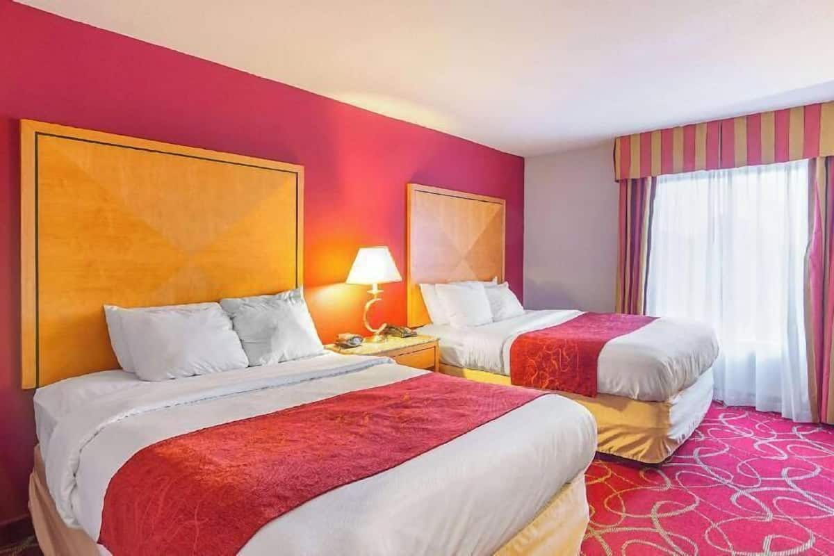 Down duvets, pillow-top beds, desk, laptop workspace