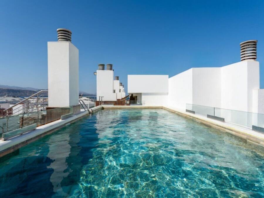 Outdoor pool, open 10:00 AM to 8:00 PM, pool umbrellas, sun loungers