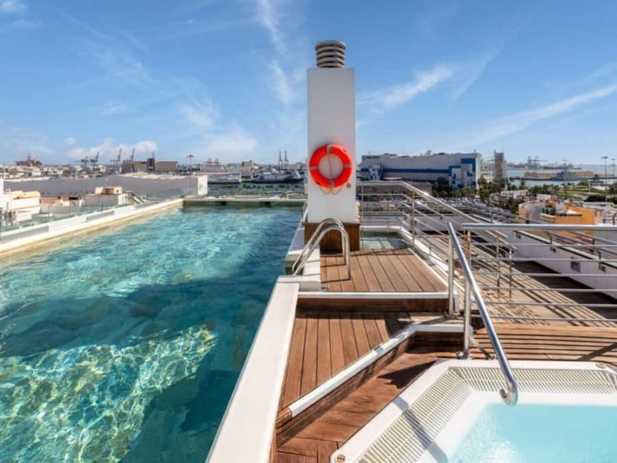 Outdoor pool, open 10:00 AM to 8:00 PM, pool umbrellas, sun loungers