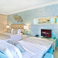 Ropa de cama de alta calidad, minibar, caja fuerte