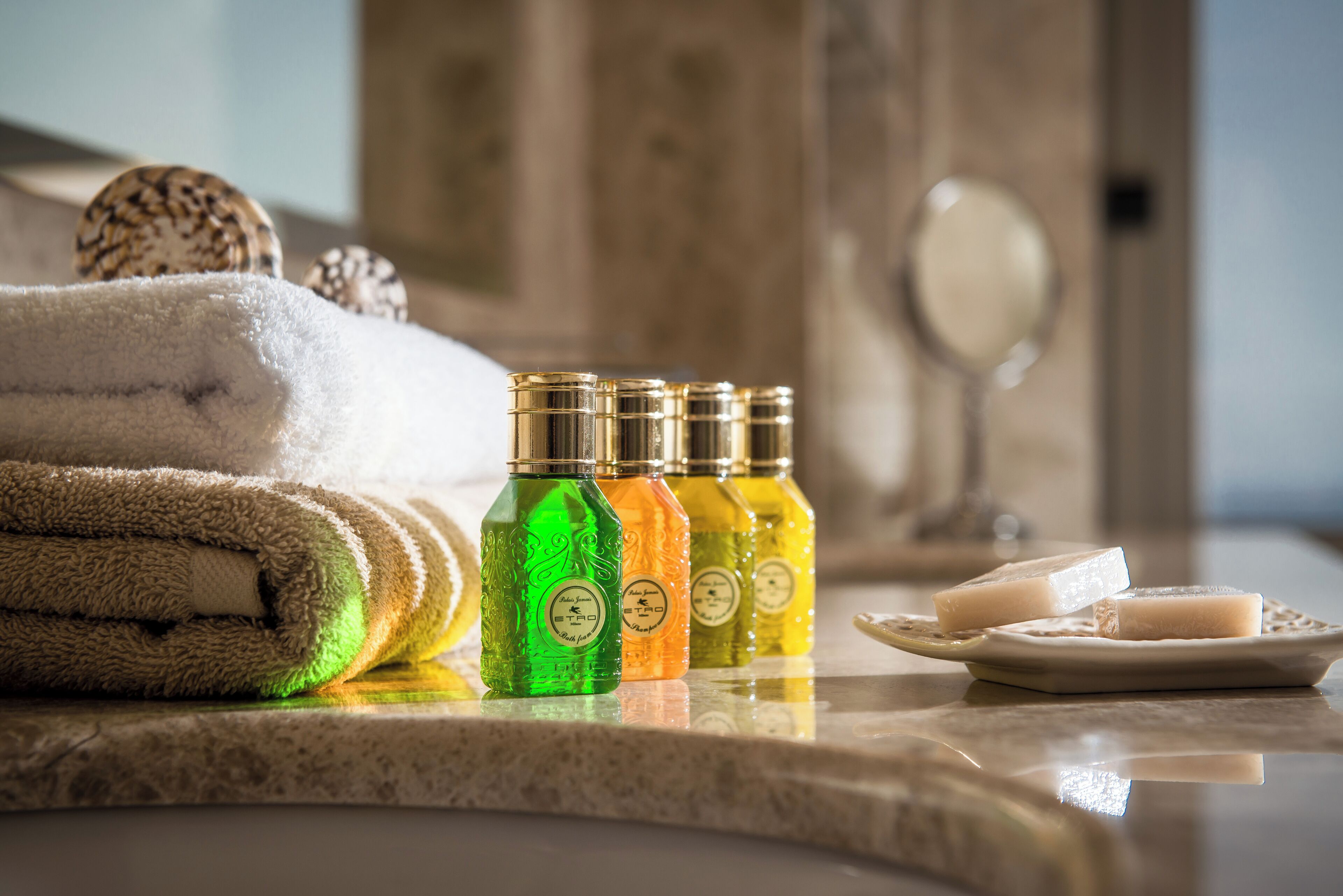 luxury suite with outdoor jetted tub | bathroom | designer toiletries, hair dryer, towels, soap