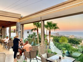 Breakfast, lunch, dinner served; beach views