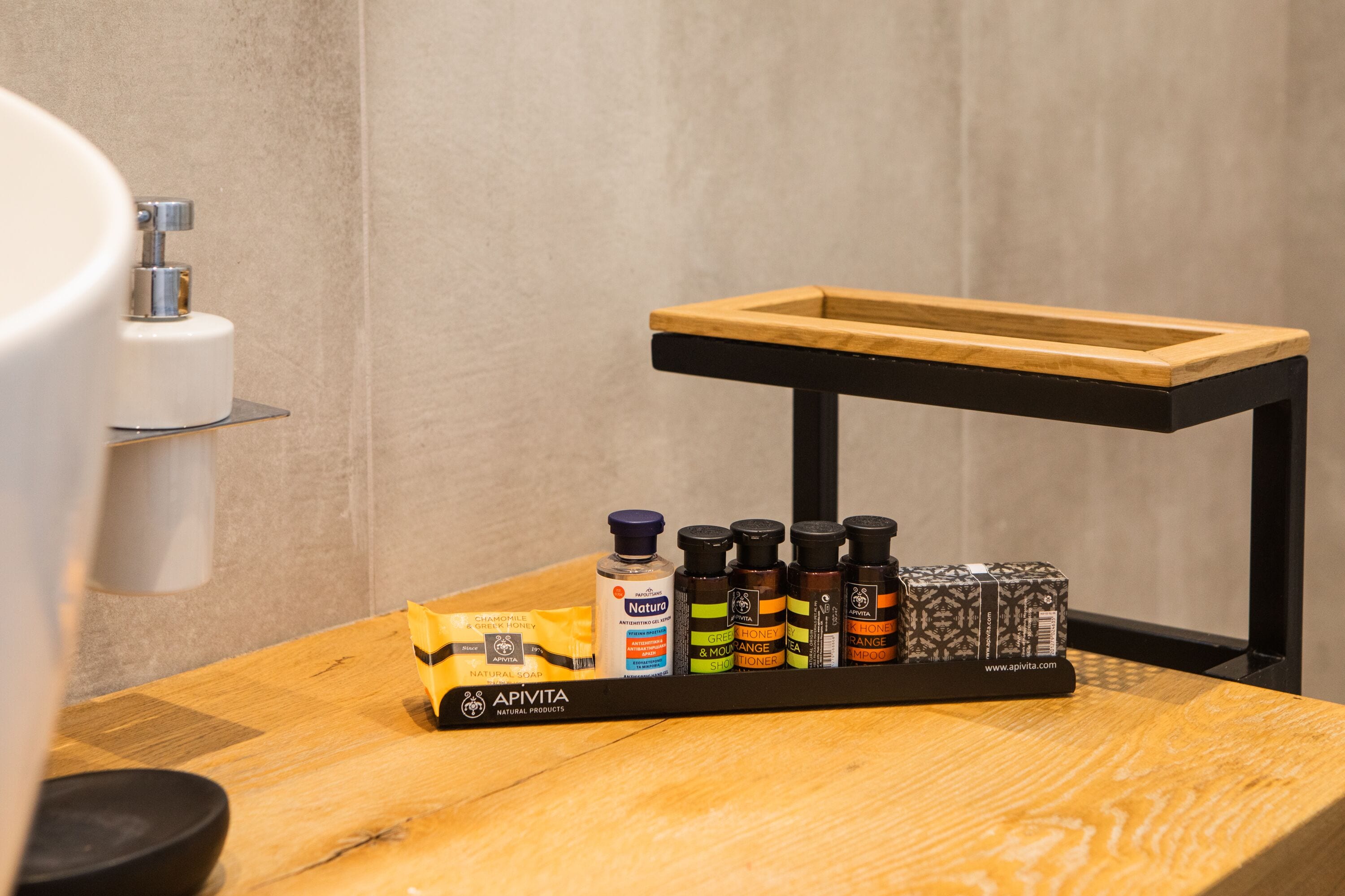 rainfall showerhead, designer toiletries, hair dryer, towels