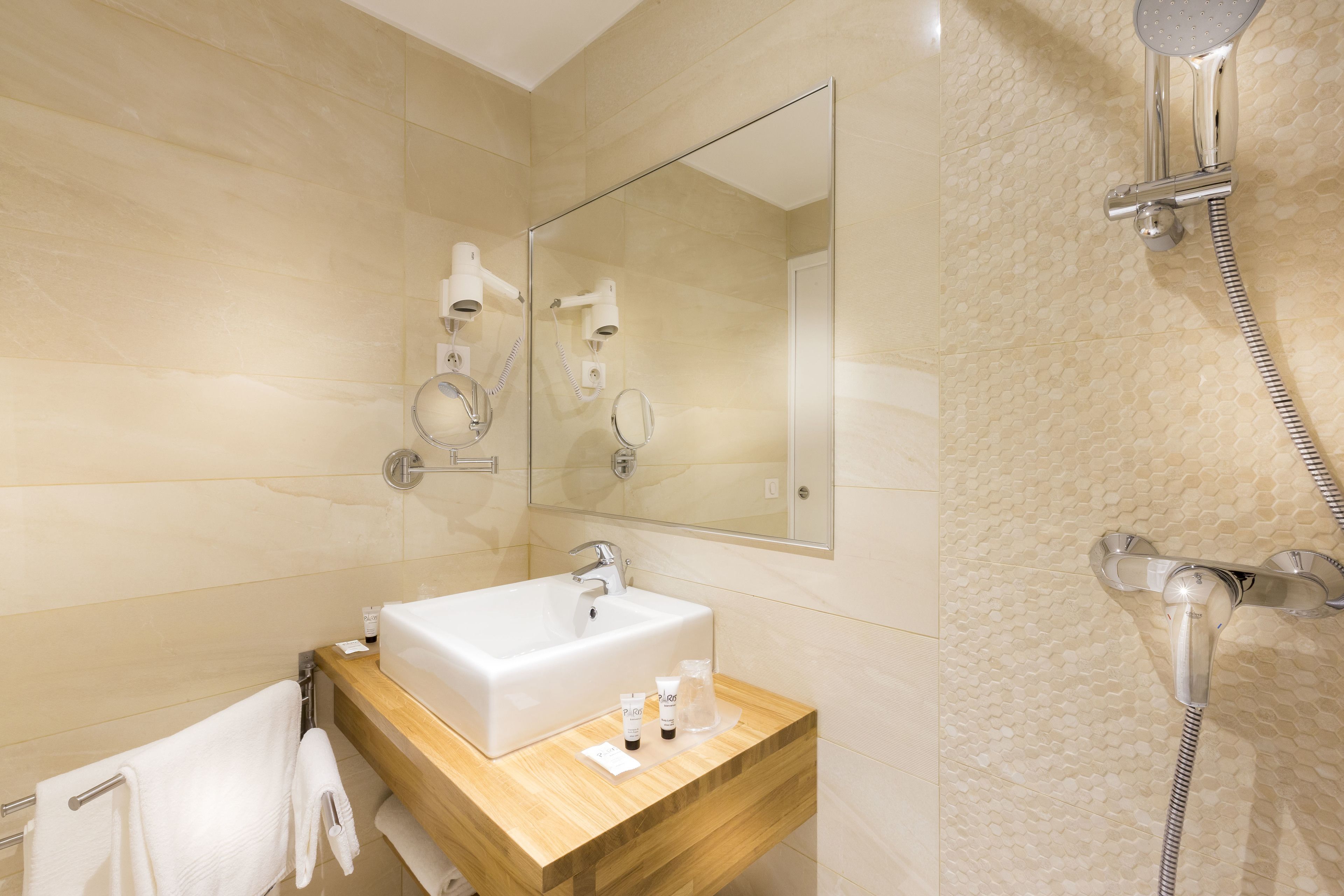 shower, free toiletries, hair dryer, towels