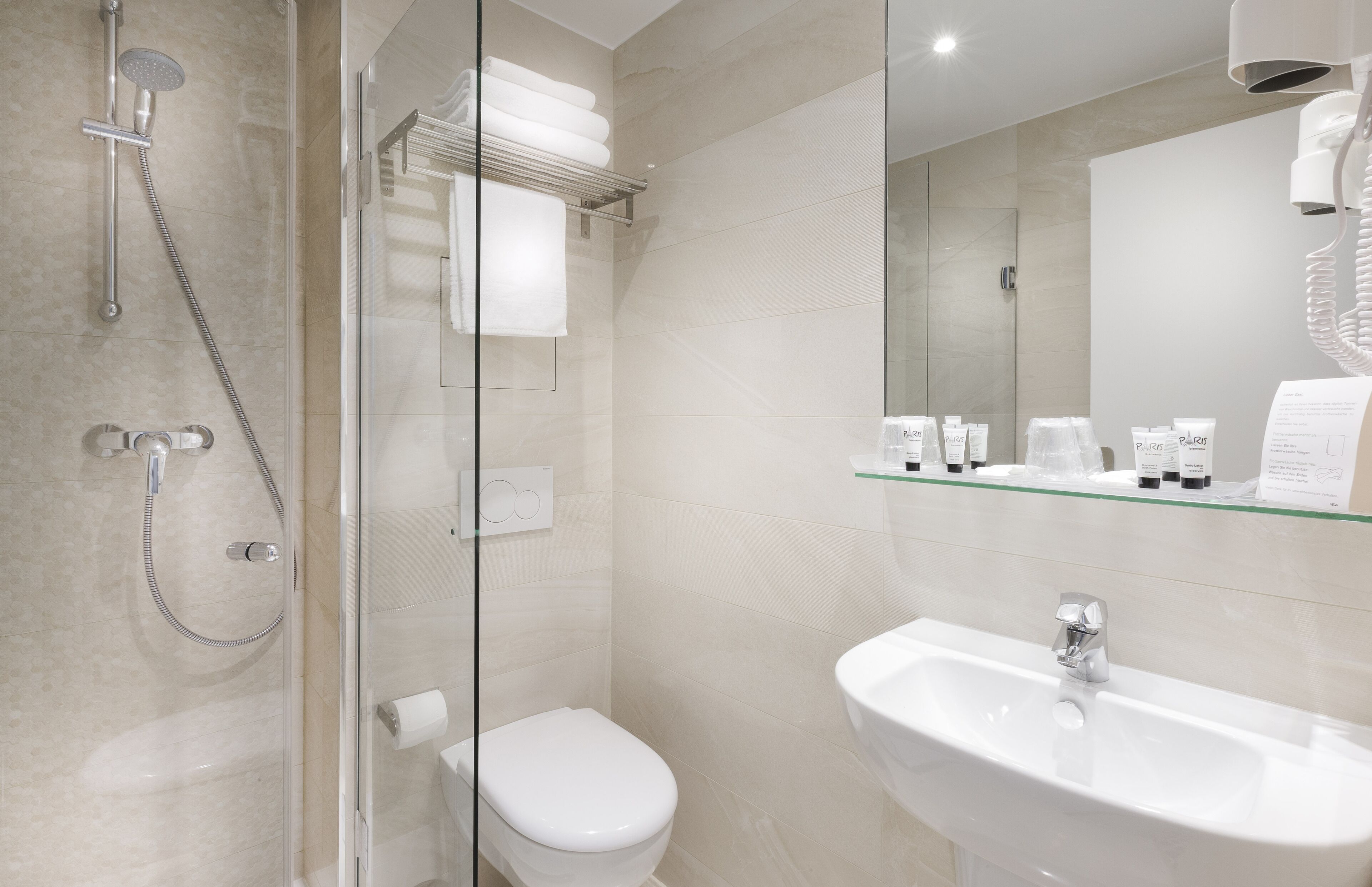 shower, free toiletries, hair dryer, towels