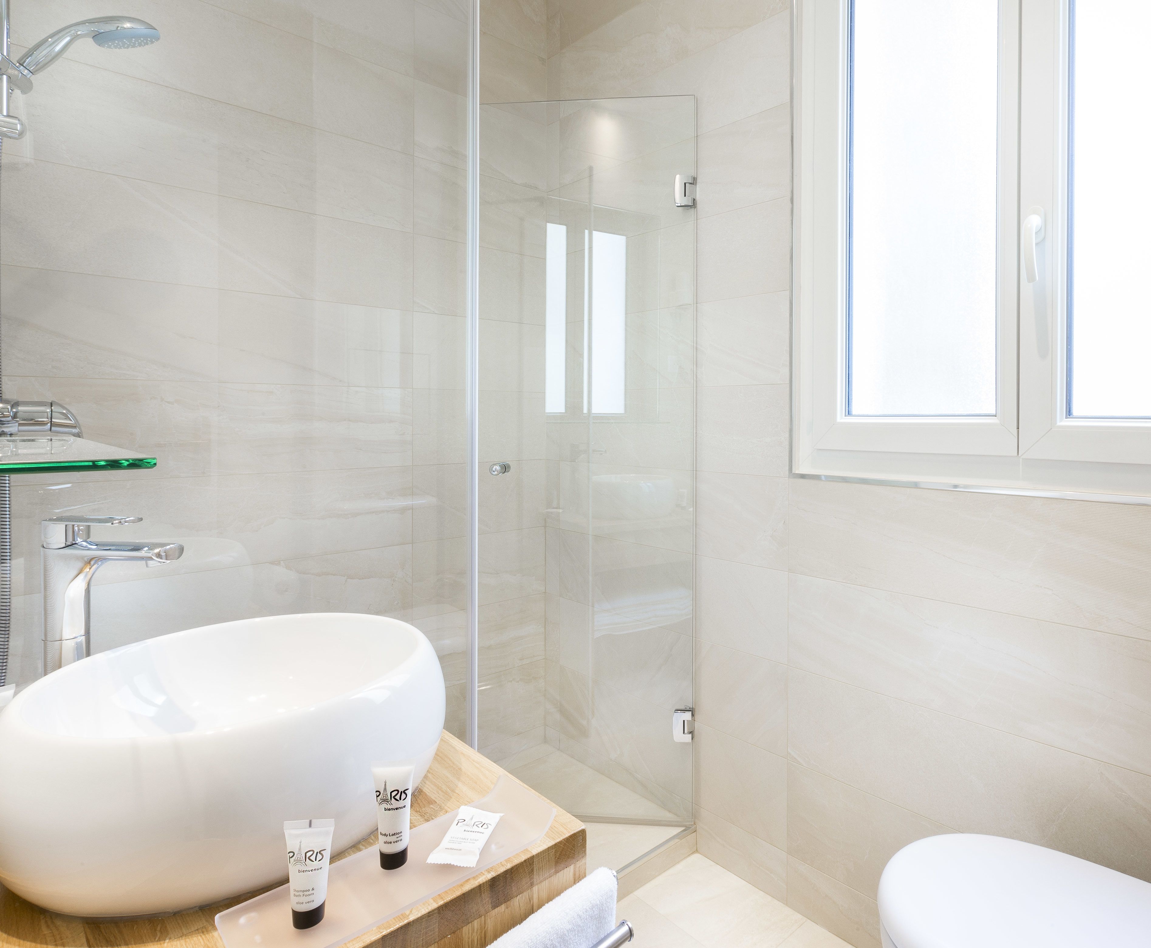 superior double room | bathroom | shower, free toiletries, hair dryer, towels