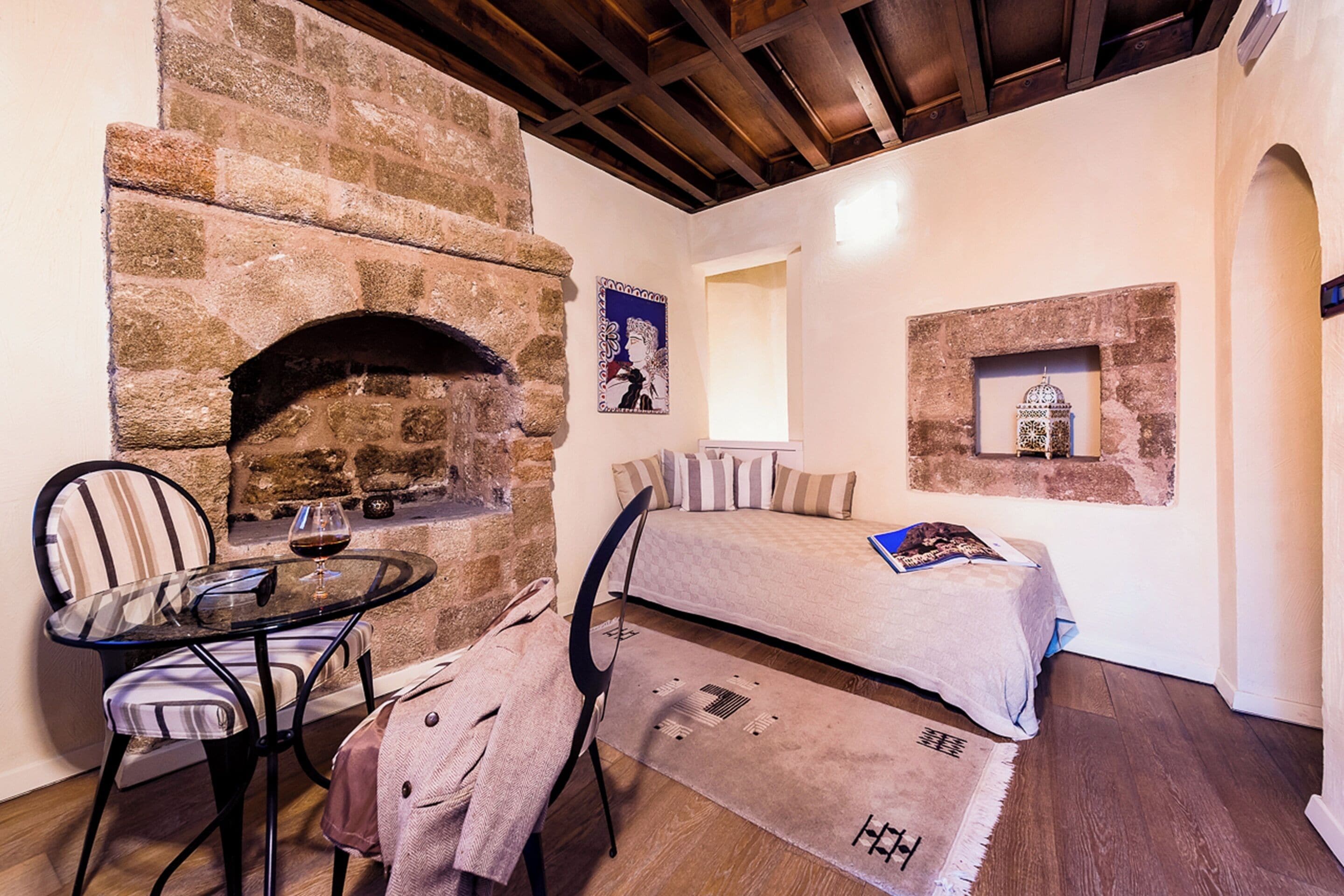 mythos junior suite with spa tub | living area | 27-inch flat-screen tv with satellite channels, tv