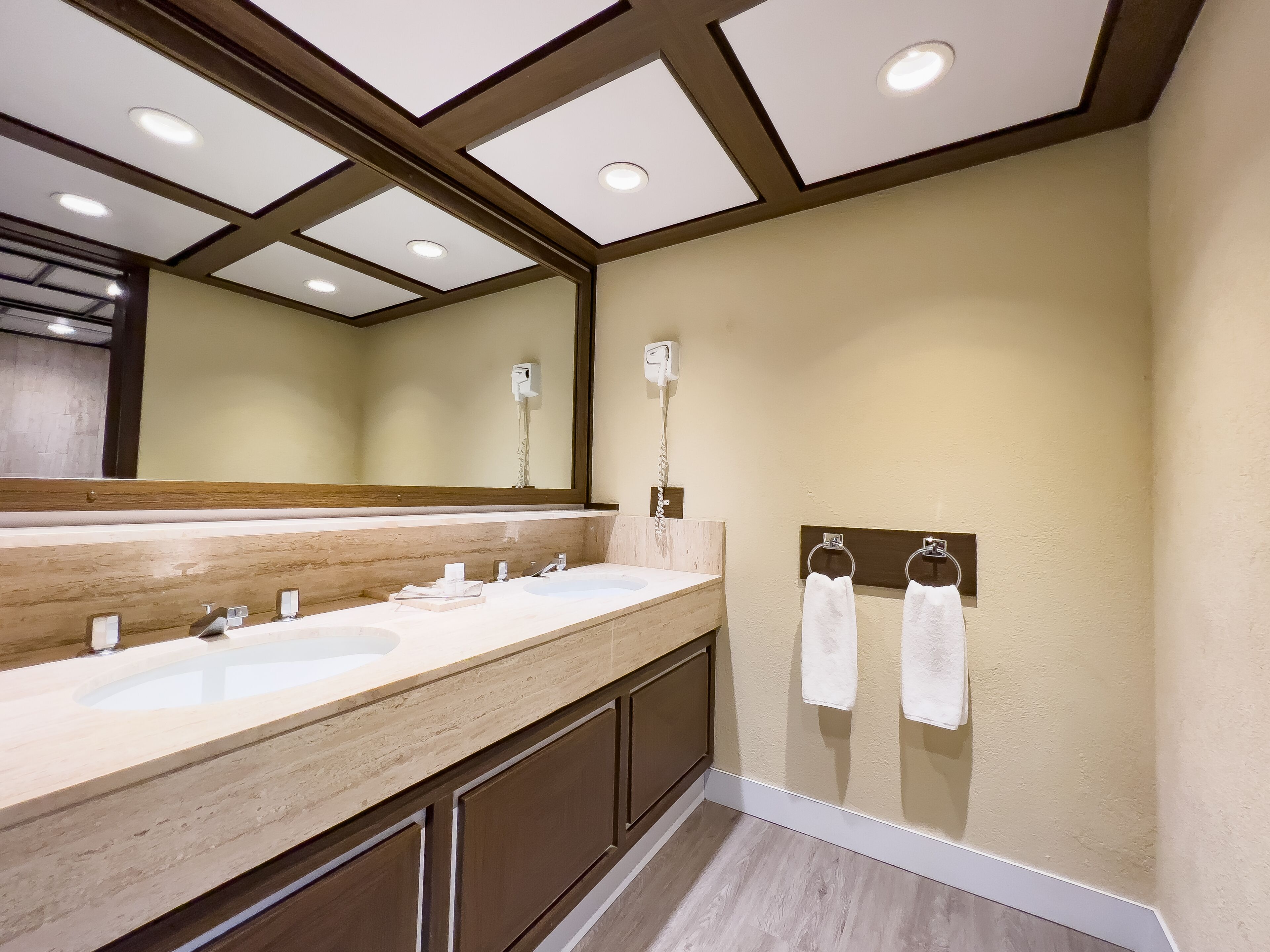 eco-friendly toiletries, hair dryer, towels