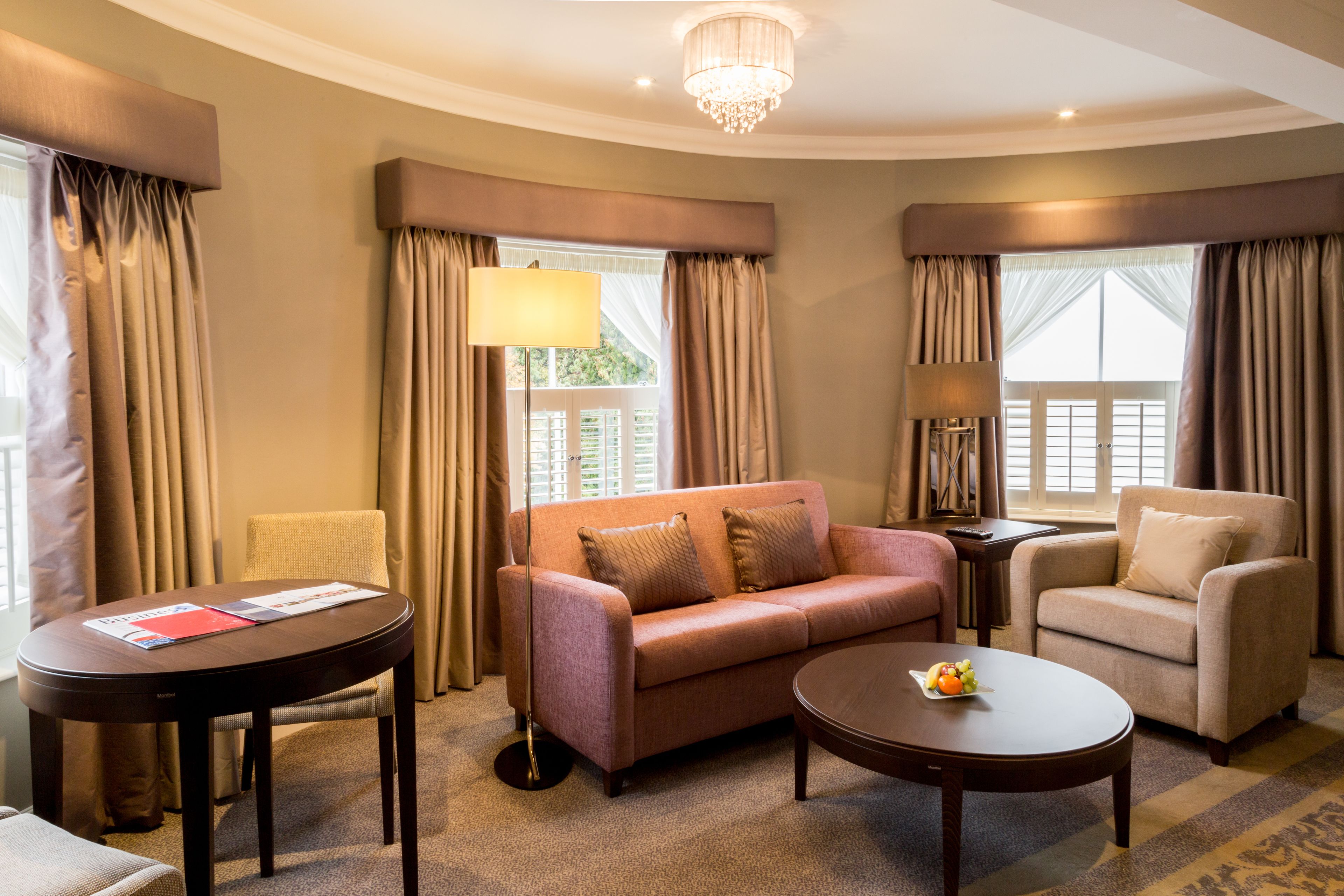 suite, 1 king bed (four poster suite) | living area | smart tv, books