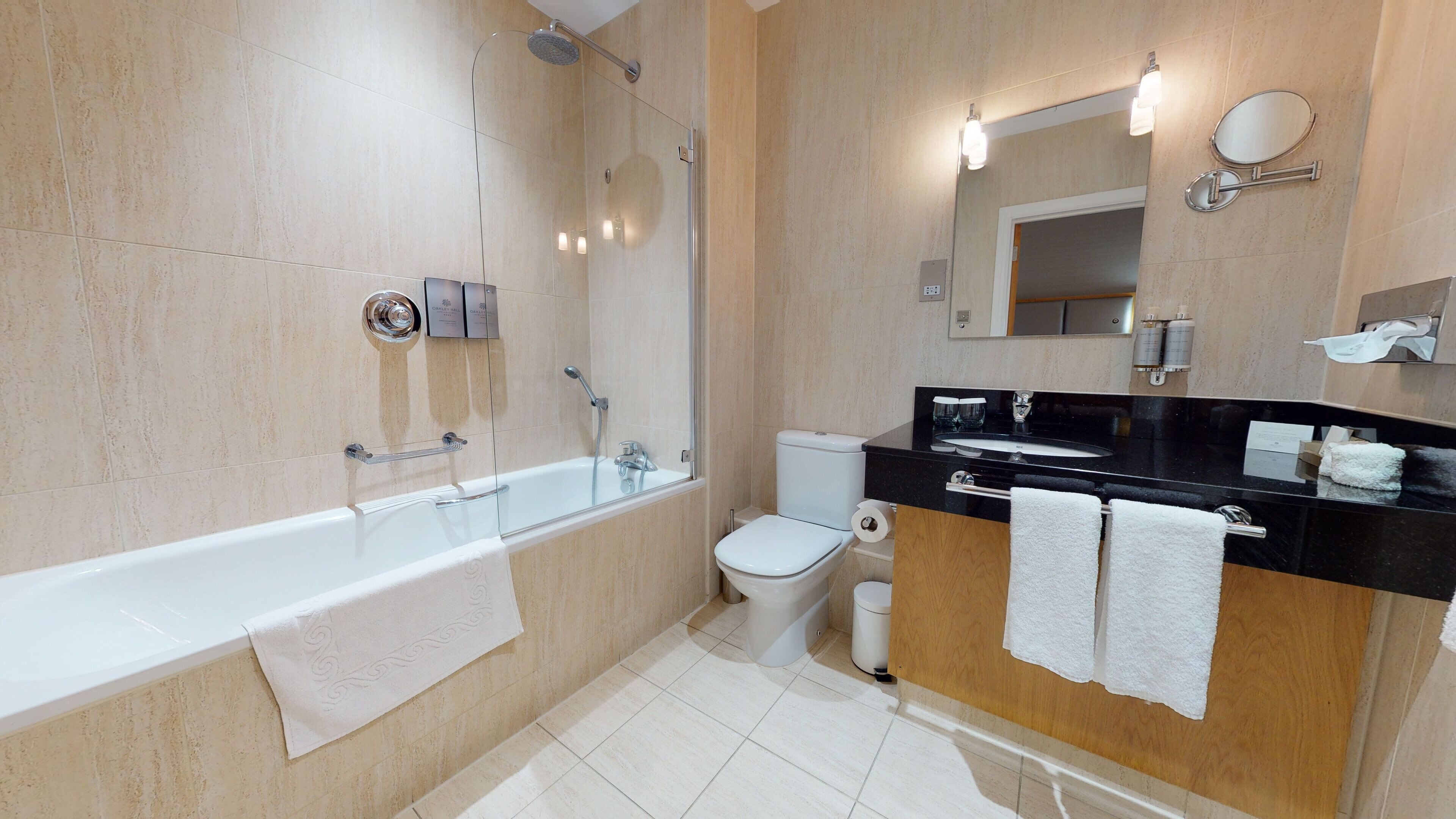 deluxe room, 1 king bed | bathroom | combined shower/bathtub, deep-soaking bathtub, designer toiletries