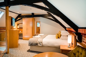 Suite, 1 King Bed (Courtyard Suite) | 1 bedroom, Egyptian cotton sheets, premium bedding, in-room safe