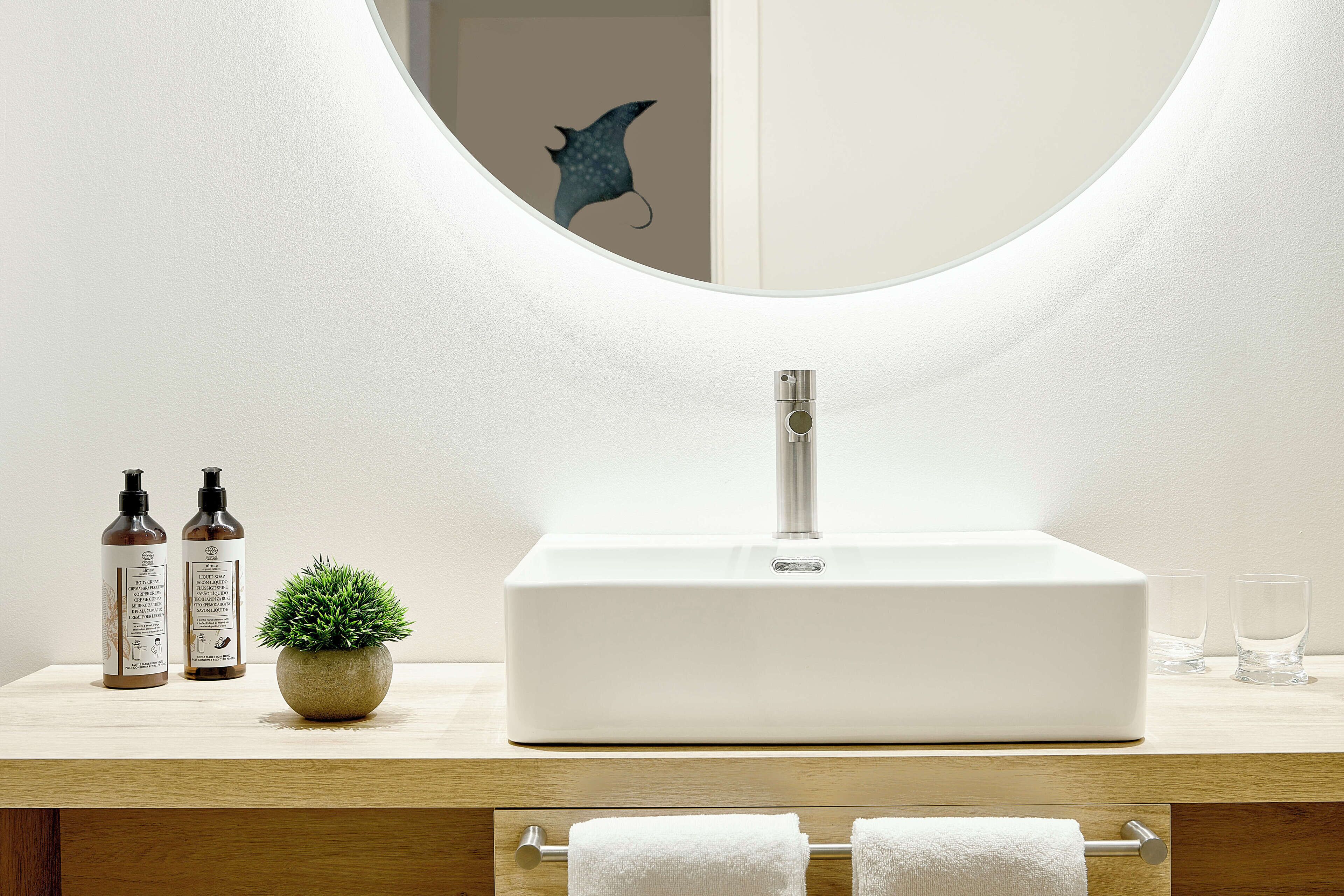 bathtub, eco-friendly toiletries, hair dryer, towels