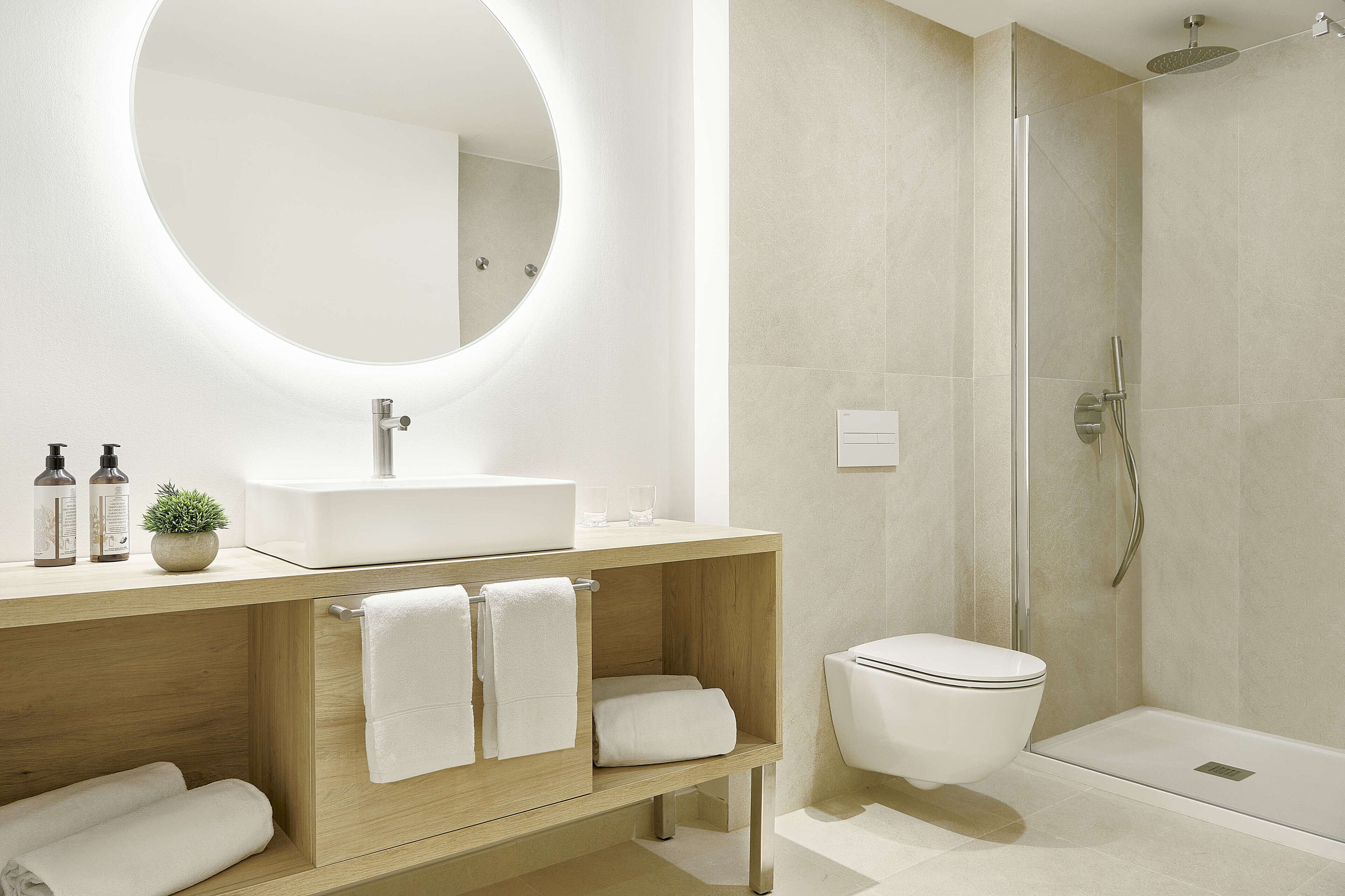 bathtub, eco-friendly toiletries, hair dryer, towels