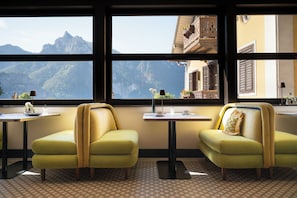 Enjoy breathtaking views of the surrounding mountains from the comfort of this stylish room.