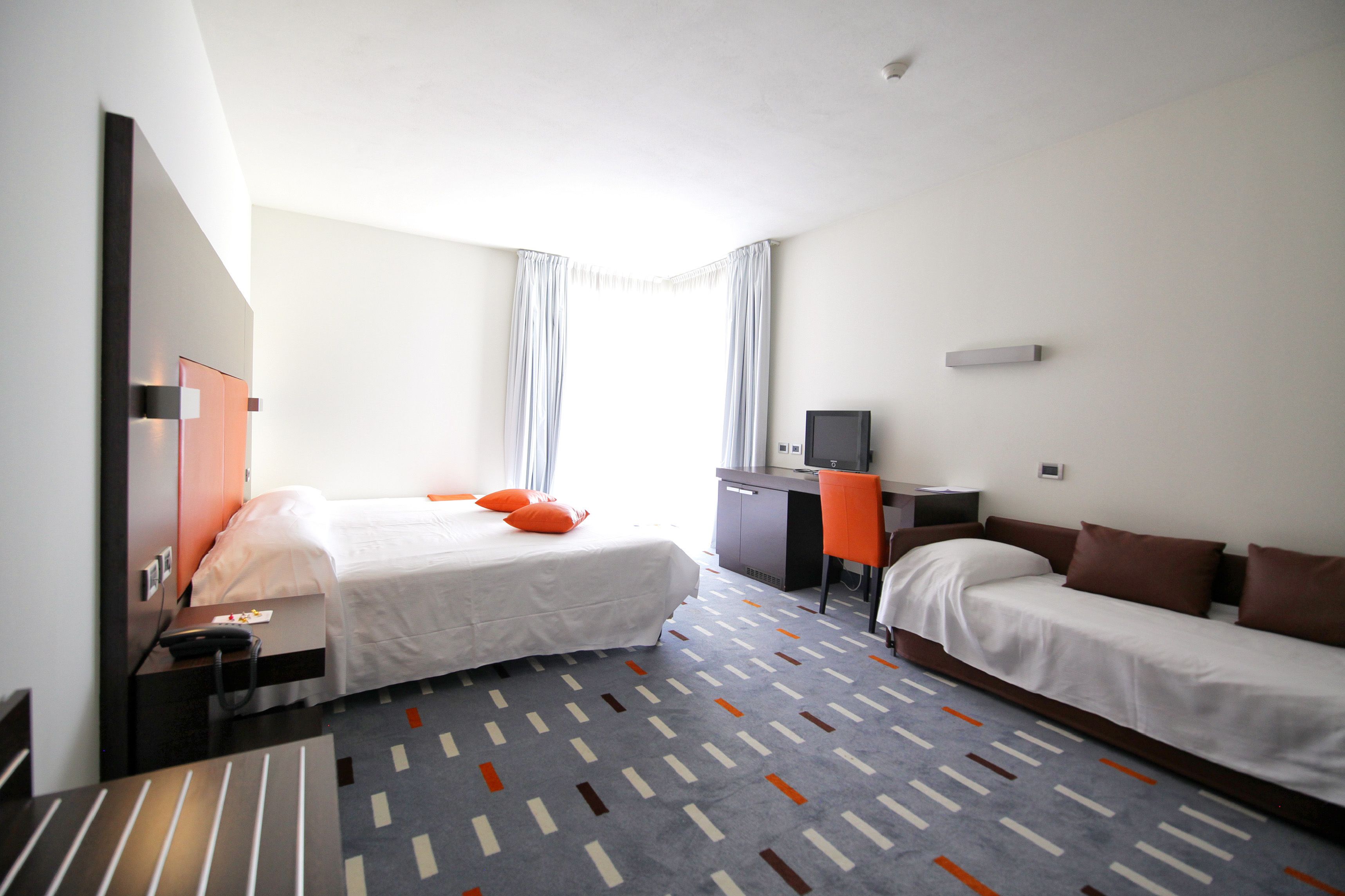 family quadruple room | 1 bedroom, minibar, in-room safe, desk