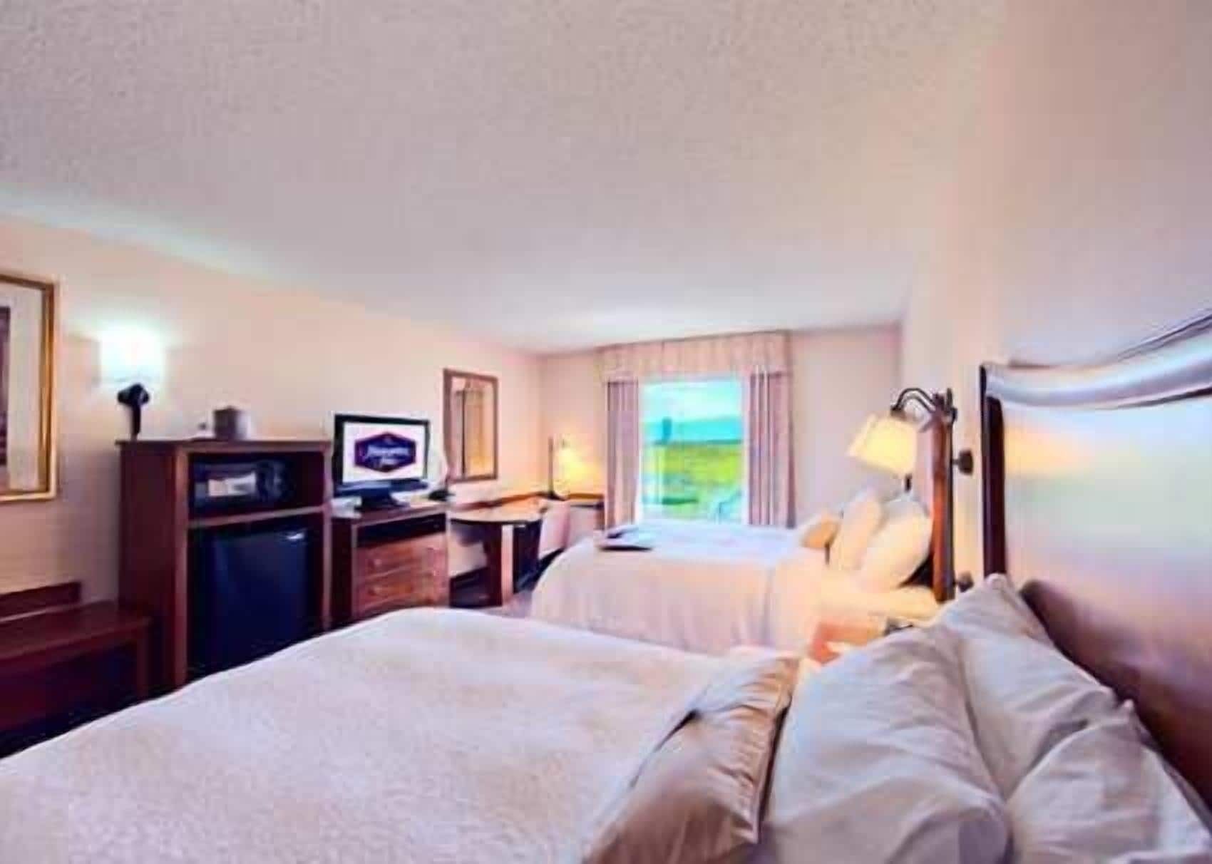 Premium bedding, down comforters, pillowtop beds, desk