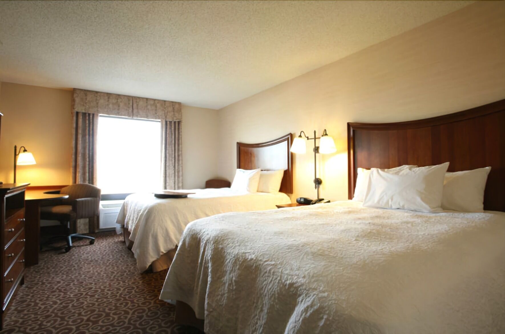 Premium bedding, down comforters, pillowtop beds, desk