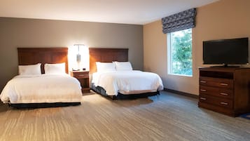 Premium bedding, down comforters, blackout drapes, iron/ironing board